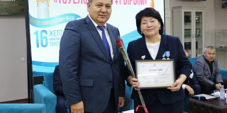 ЖЕЛТОҚСАН ОҚИҒАСЫ ҚАТЫСУШЫЛАРЫНА ҚҰРМЕТ КӨРСЕТІЛДІ